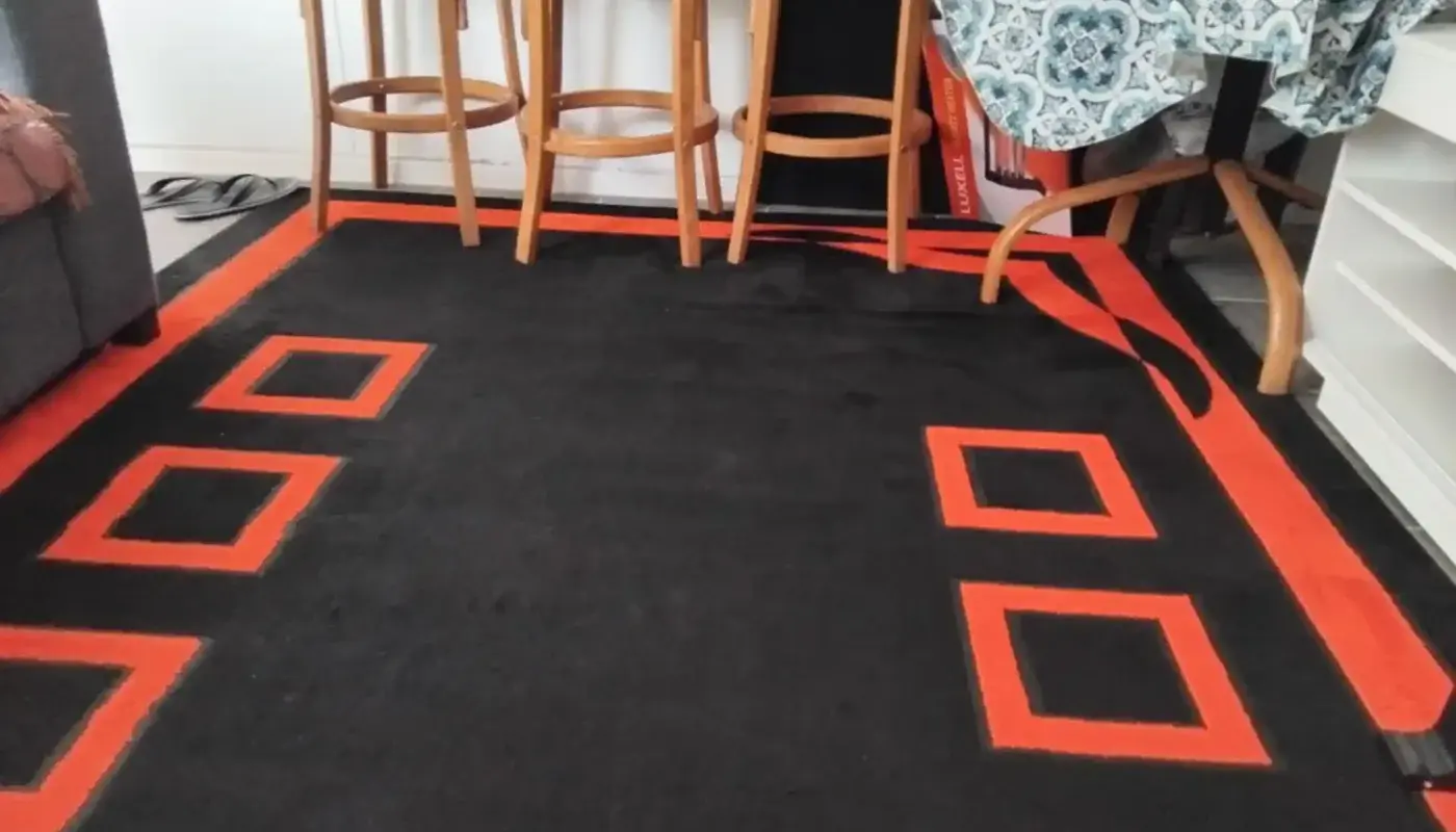 Freshly cleaned area rug in a living room